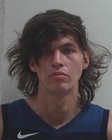 Mugshot of HIMANGO, TRAVIS MARTIN 